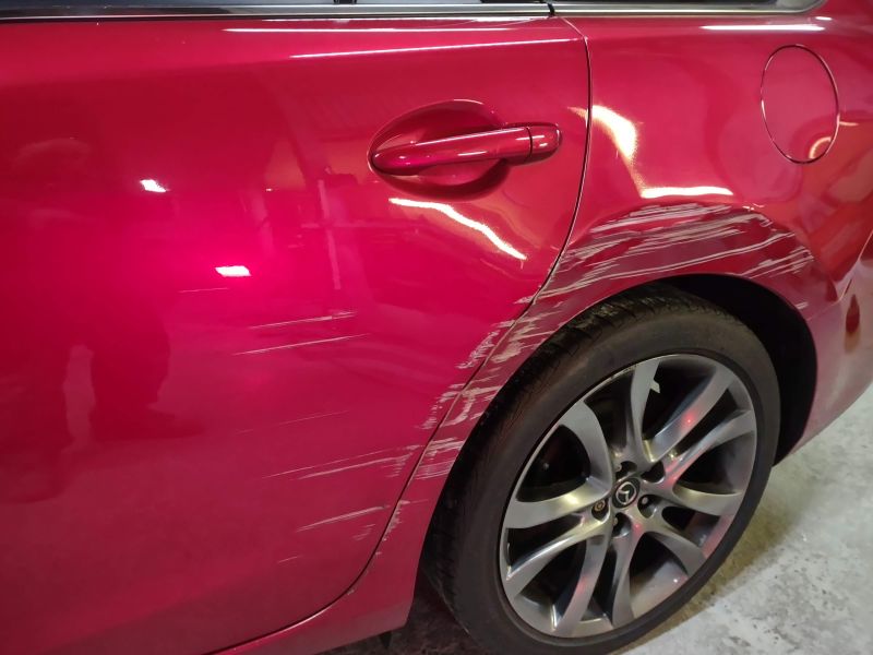 Passenger side rear wheel arch and door damage on this Mazda and with the Colour code being 41V representing the colour Soul red a three stage candy red pearl which are notoriously difficult to paint, but with the right application technique, materials and training you can produce a quality repair result restoring the vehicle to pre-accident condition.: Swipe To View More Images