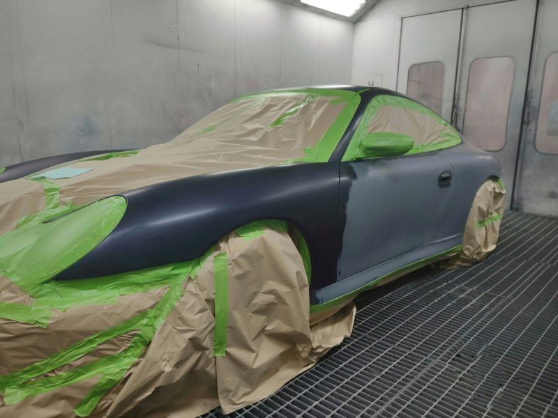 A 2003 midnight blue Porsche Carrera 4S came into Coachpainters in very good condition considering it's two decades old. A few car park dents down both sides, stone chips in the front bumper and some old poor previous paintwork to rectify was all that was needed. So we decided to do a respray to tidy this German classic sport car up and make it look like it should.: Swipe To View More Images