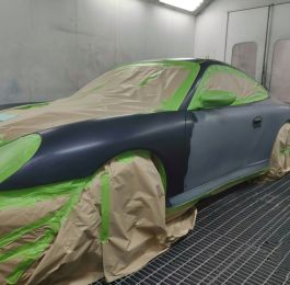A 2003 midnight blue Porsche Carrera 4S came into Coachpainters in very good condition considering it's two decades old. A few car park dents down both sides, stone chips in the front bumper and some old poor previous paintwork to rectify was all that was needed. So we decided to do a respray to tidy this German classic sport car up and make it look like it should.: Click Here To View Larger Image